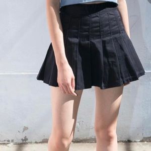 Tennis pleated skirt brandy Melville. Had to pay duties/ fees for shipping